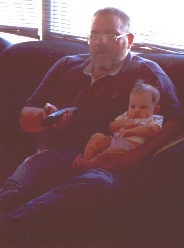 Dad and Nicole watching fishing.